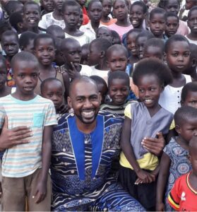 Dr Edward visiting the children in Soroti, Ugnada